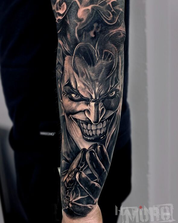 Tattoo Joker in 3D motif and realistic style On the arm