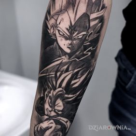 Tatuaż Songo na ręce motyw: czarno-szare styl: kreskówkowe / komiksowe