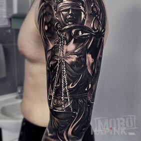 Tattoo Themis On the arm motif: characters style: realistic