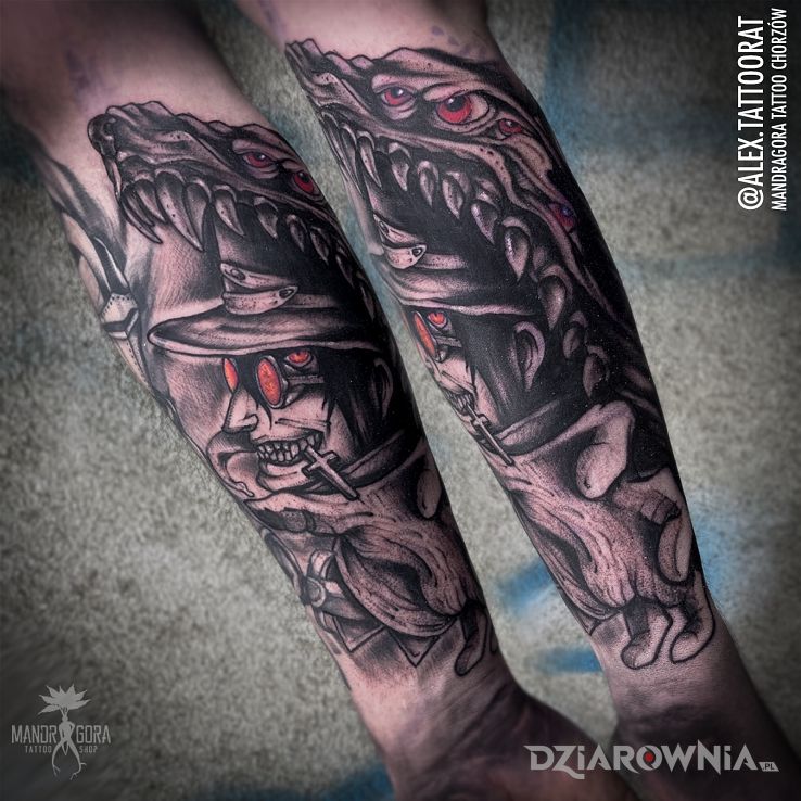 Tatuaż alucard w motywie demony i stylu realistyczne na przedramieniu