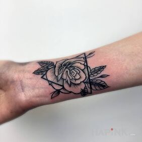 Tattoo Rose On the arm motif: black and gray style: graphic / illustrative
