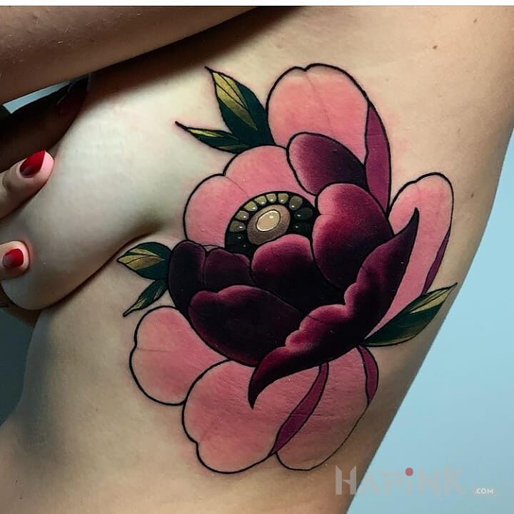 Tattoo Bordowy kwiat in flowers motif and neo-traditional style on the ribs