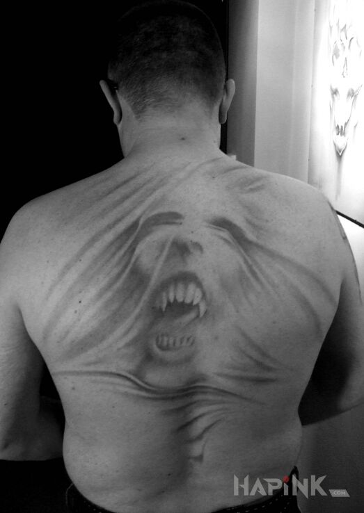 Tattoo Mój demon... in faces motif and graphic / illustrative style on the back