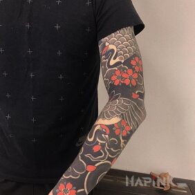 Tattoo Herons on the upper arm motif: flowers style: japanese / irezumi