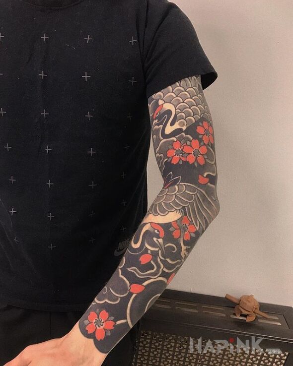 Tattoo Czaple in black and gray motif and japanese / irezumi style on the forearm