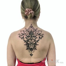 Tattoo Ornament on the back motif: ornaments style: blackwork / blackout