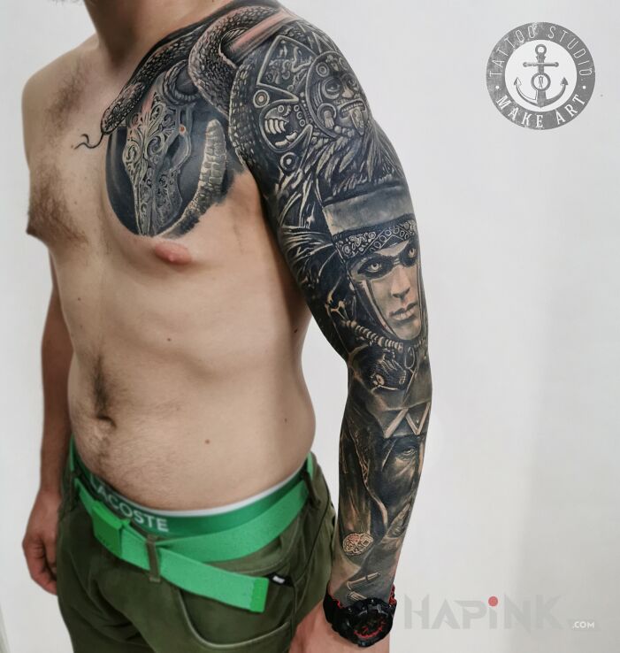 Tattoo Azteckie klimaty in dark motif and realistic style on the upper arm
