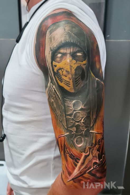 Tattoo Skorpion in colorful motif and realistic style on the upper arm