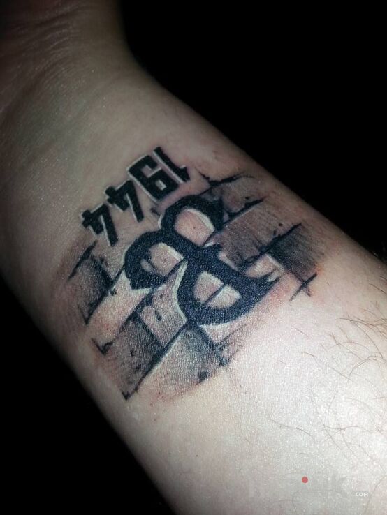 Tattoo PW in patriotic motif on the wrist