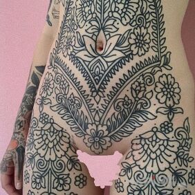 Tattoo Outline tattoos on a large area on the stomach motif: black and gray style: contour / linework