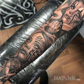 Tattoo Two female faces with tattoos ? on the upper arm motif: sleeves style: realistic