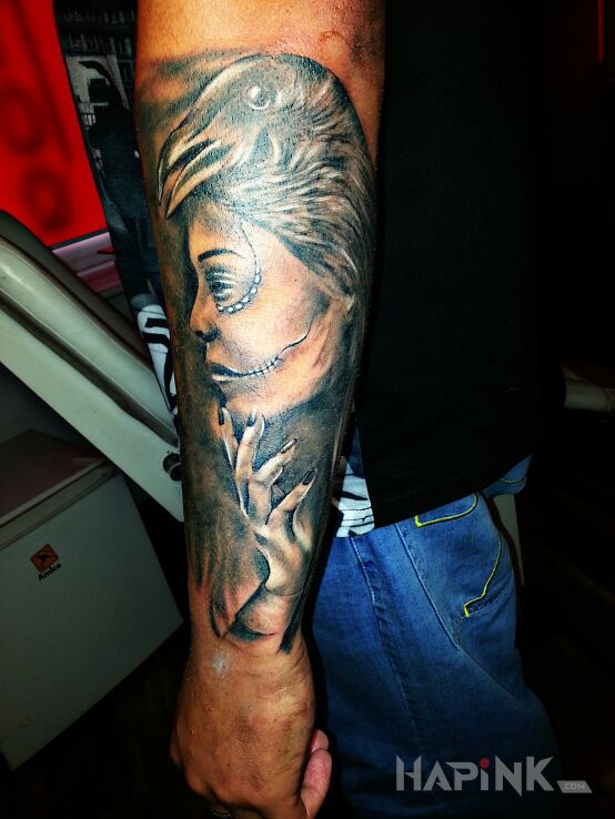 Tattoo Muerte in demons motif on the forearm