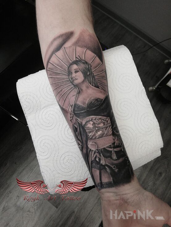 Tattoo Sexy japan in black and gray motif and realistic style on the forearm
