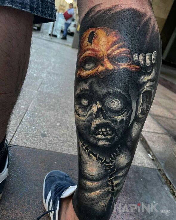 Tattoo Potworek in dark motif and realistic style on the calf