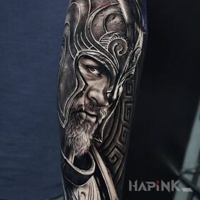 Tattoo Knight in a helmet On the arm motif: black and gray style: realistic