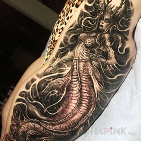 Tattoo Demonic female figure on the leg motif: dark style: realistic
