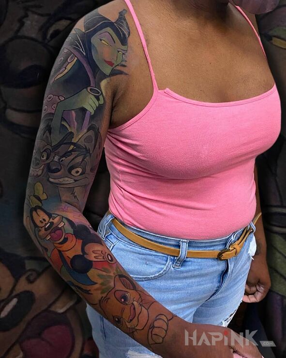 Tattoo Postacie ze znanych bajek in sleeves motif and cartoon / comic book style On the arm