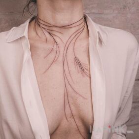 Tattoo Ear of Grain on the chest motif: black and gray style: contour / linework