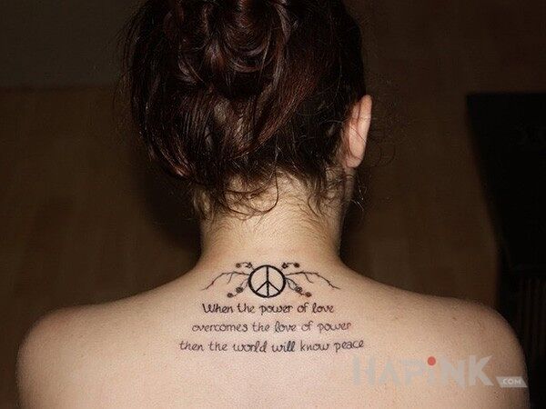 Tattoo Pacyfizm in lettering motif on the back