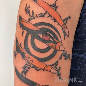 Tattoo Kurama (Naruto) on the upper arm motif: manga / anime style: graphic / illustrative