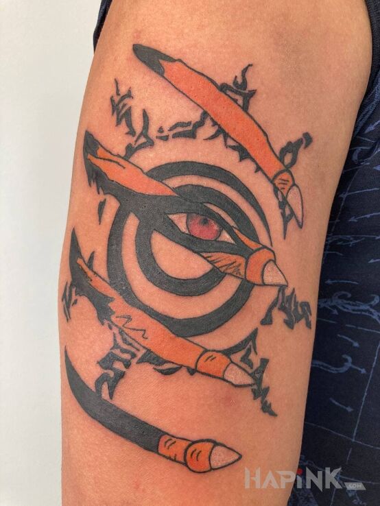 Tattoo Kurama (Naruto) in manga / anime motif and graphic / illustrative style on the upper arm
