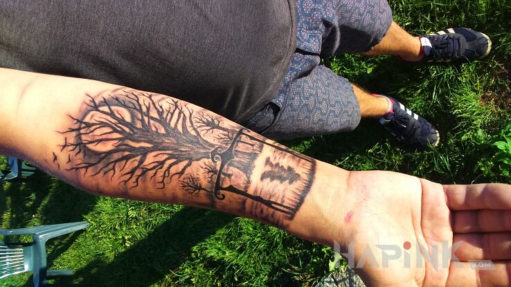 Tattoo Drzewo in objects motif on the forearm