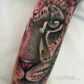 Tattoo Leopard on the forearm motif: animals style: realistic