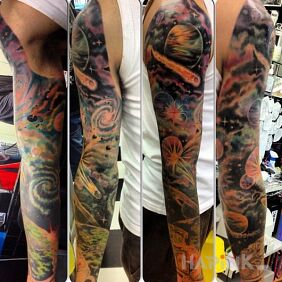Tattoo Space sleeve on the forearm motif: cosmos