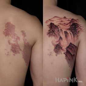 Tattoo Transformed birthmark on the shoulder blades motif: colorful style: realistic