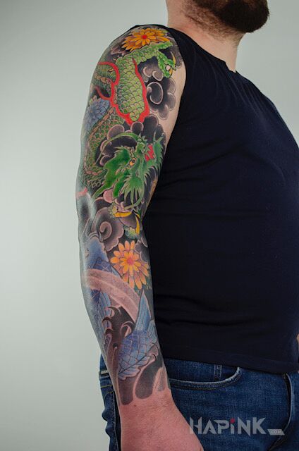 Tattoo Japoński tatuaż in colorful motif and japanese / irezumi style On the arm