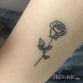 Tattoo Little Rose On the arm motif: black and gray style: contour / linework