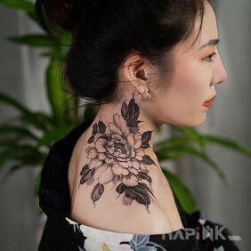 Tattoo Peony on the shoulder motif: black and gray style: realistic