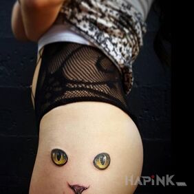 Tattoo Cat's eyes on the leg motif: animals
