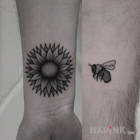 Tattoo Flower and bee on the forearm motif: flowers