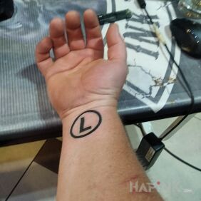 Tattoo LEGIA on the wrist motif: other style: minimalistic