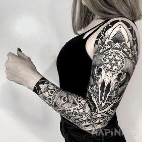 Tattoo Skull mixed with a touch of geometry On the arm motif: skulls style: realistic