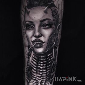 Tattoo Little she-devil On the arm motif: demons style: realistic