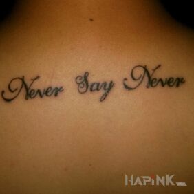 Tattoo Never Say Never ;) on the hand motif: lettering