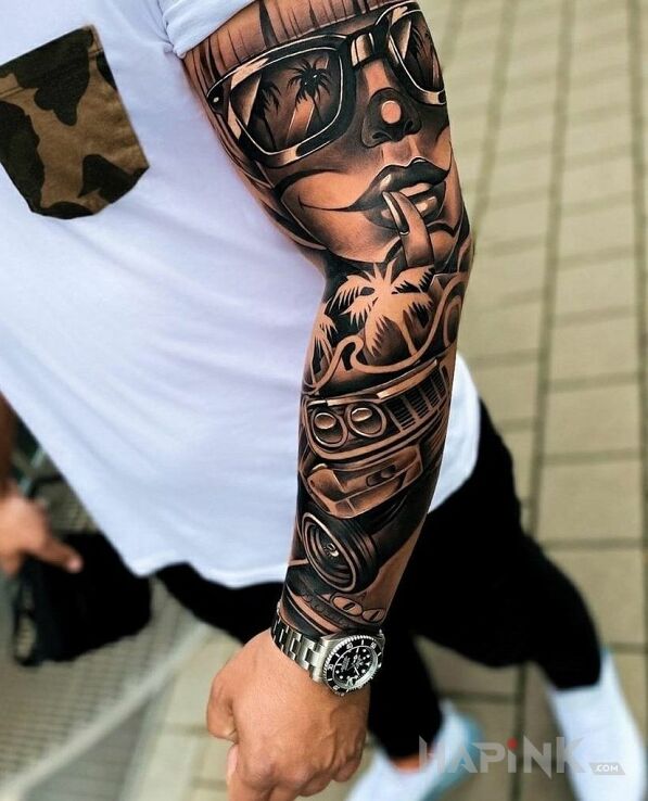 Tattoo Dziewczyna w okularze in faces motif and chicano style on the forearm