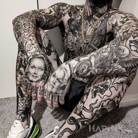 Tattoo Tattoo on tattoo au on the upper arm motif: skulls style: realistic