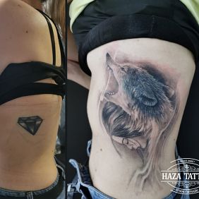 Tattoo Wolf girl cover up on the ribs motif: black and gray style: realistic