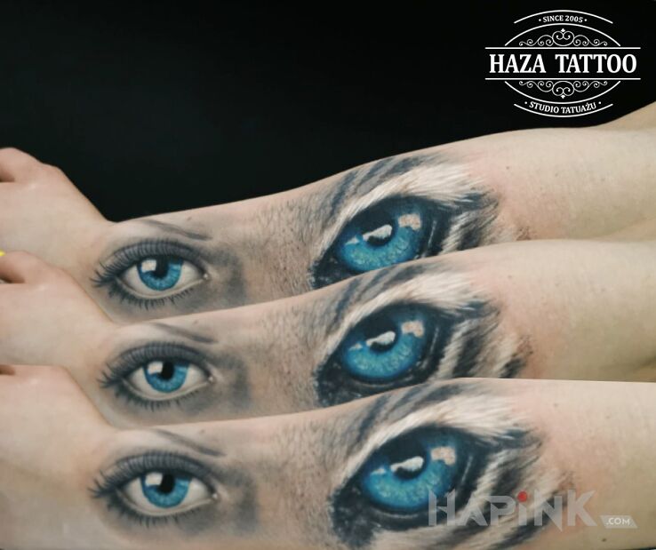 Tattoo Tiger woman / scar in animals motif and realistic style on the forearm