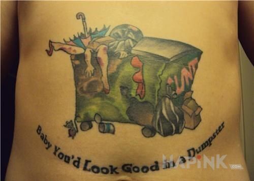 Tattoo Konkretne ścierwo in lettering motif on the stomach