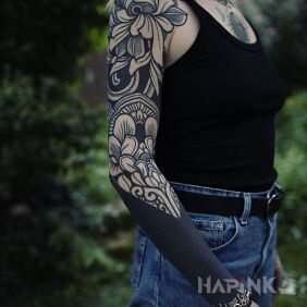 Tattoo Flowers with black On the arm motif: black and gray style: graphic / illustrative