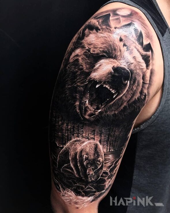 Tattoo Grizzle in animals motif and realistic style on the upper arm