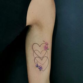 Tattoo Hearts flowers family on the bicep motif: flowers style: graphic / illustrative