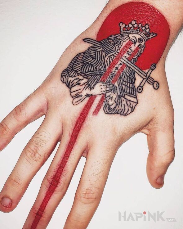 Tattoo Zabojca krolow in characters motif and engravings / gravure style on the hand
