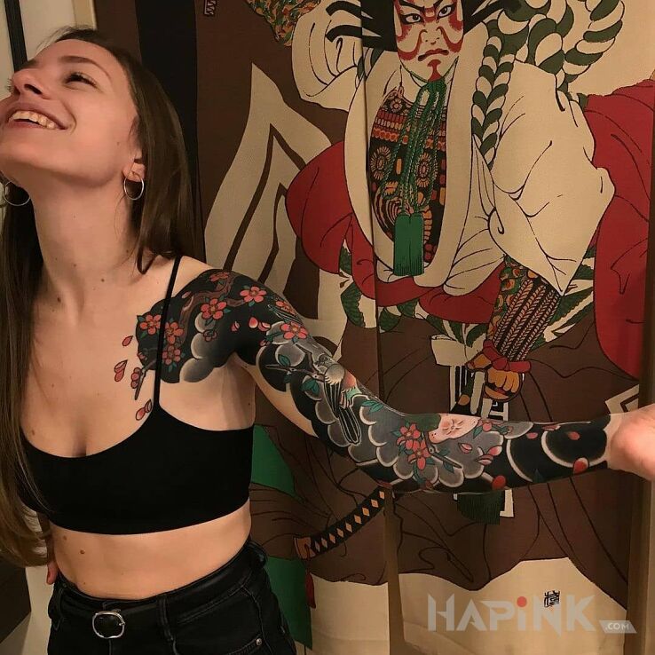 Tattoo Uśmieszek in sleeves motif and japanese / irezumi style on the chest