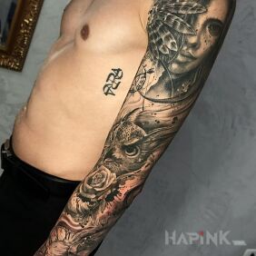 Tattoo Half of a woman's face On the arm motif: faces style: realistic