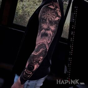 Tattoo Grandfather and his wolf on the forearm motif: faces style: realistic